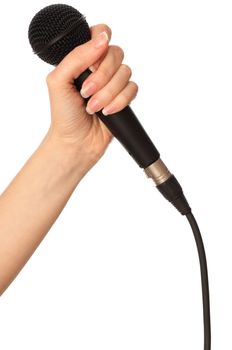 woman holding big black microphone for singing