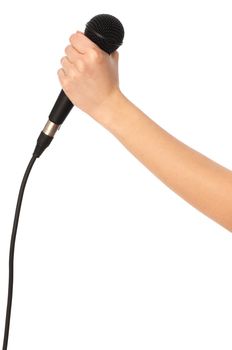 woman holding big black microphone for singing