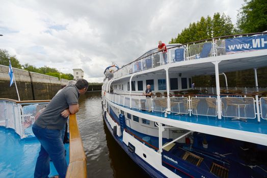 Passangers on the cruise ship board. Taken  on the river lock of Moscow canal, on July 2012