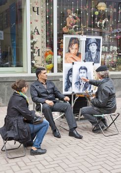 Street artist in Moscow Russia, taken on April 2012