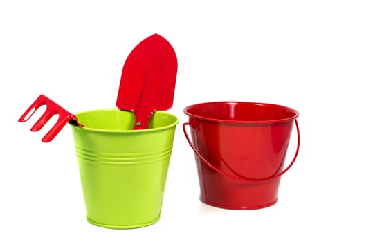 Garden tools and red green bucket