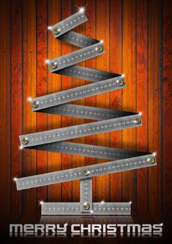 Metallic Christmas tree with bolts heads on wood background
