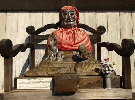 wooden statue of Binzuru (Pindola) at the entrance of Todai-ji temple in Nara, Japan.