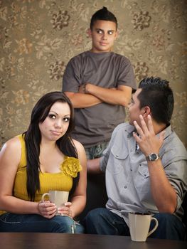 Frustrated father and mother with disrespectful son