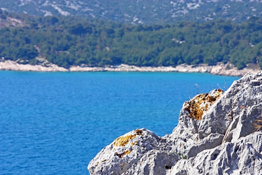 A view of white rock and blue sea