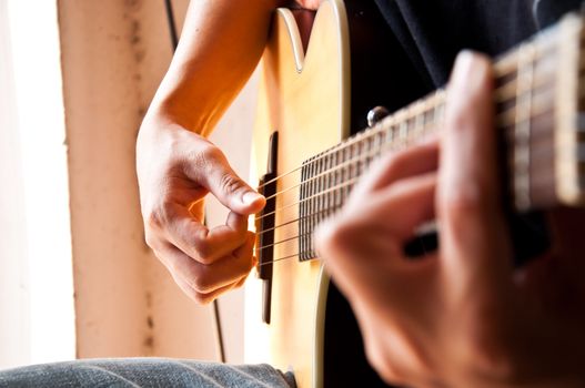 playing guitar