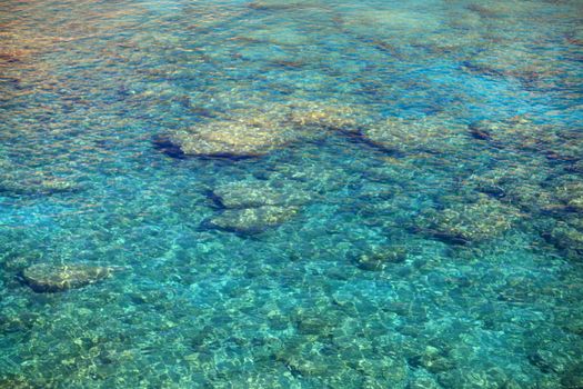 Crystal clear waters at Anthony Quinn Bay in Greece