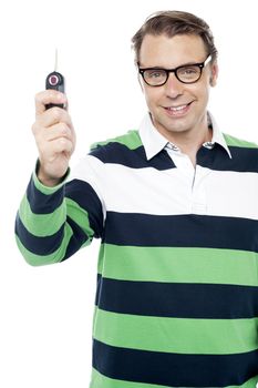 Get ready to test drive new car. Young salesman offering you keys