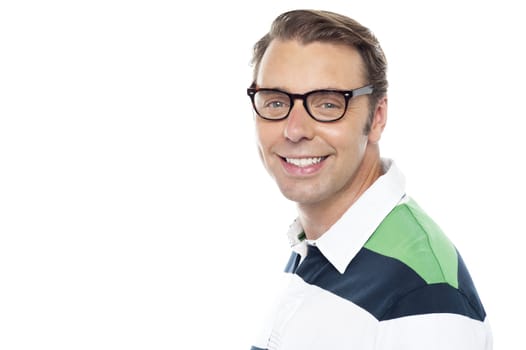 Closeup shot of cheerful young casual guy looking at you