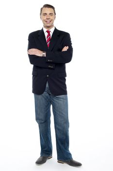 Confident young consultant with his arms crossed. Full length shot
