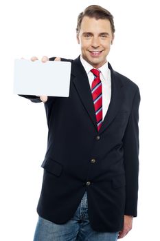 Confident sales representative presenting blank placard. Place your business ad here
