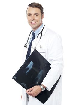 Smart surgeon holding x-ray report of a patient isolated against white background