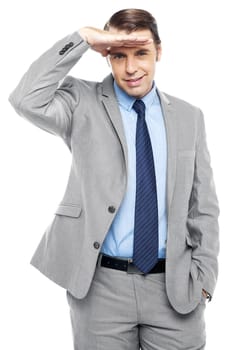 Handsome businessman watching something closely isolated over white