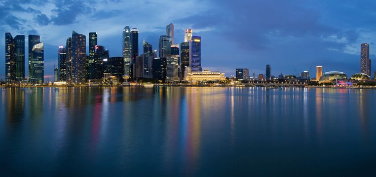 Singapore City Skyline along Singapore River Panorama at Blue Hour