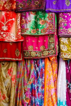 Colorful clothes and saris on display