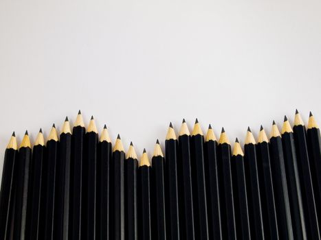 Wave of black pencils