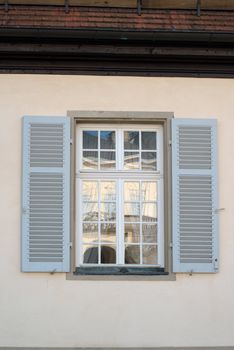 Window reflecting the rococo style Palace of the Solitude in Stuttgart, Germany was built as summer residence between 1764 and 1769 under Duke Karl Eugen of Württemberg.