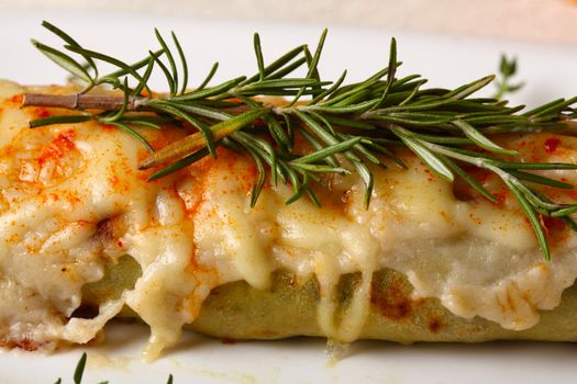 Baked cannellone with cream and cheese