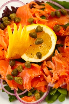 Delicious salmon salad and capers