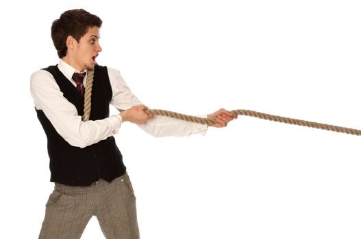 strong-willed man pulling of a rope and wins as a symbol of success