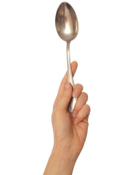woman holding tablespoon in the hand for feeding a sick person