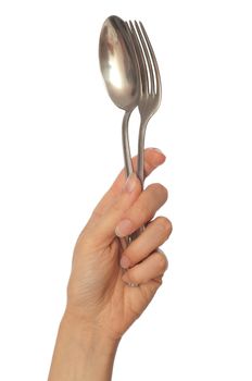 woman holding tablespoon and fork in the hand to tableware the dinner