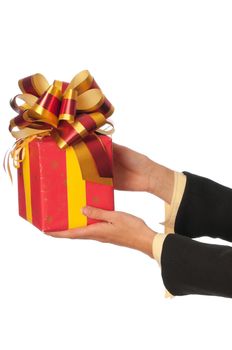 Woman holding red box with yellow bow as a present
