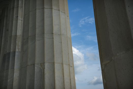 Pillars with Blue Sky and Clouds