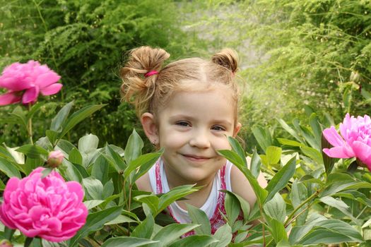beautiful little girl in garden