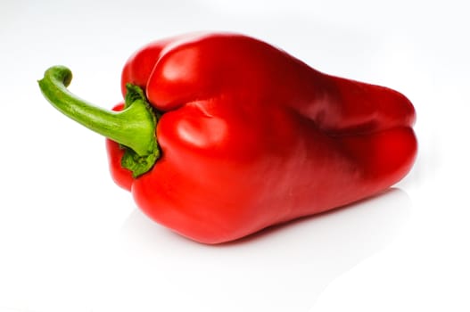 Big red pepper isolated on white background