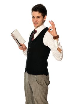 businessman writing a daily plan of action in his notebook