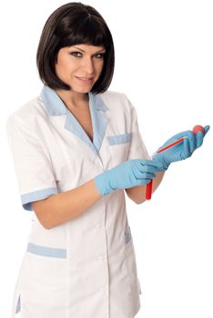 Doctor in blue gloves will be carry out research a samples of bloods at inhabitants of coast on availability of poisoning