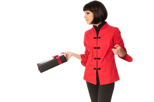 woman holding a black box with red bow as a gift