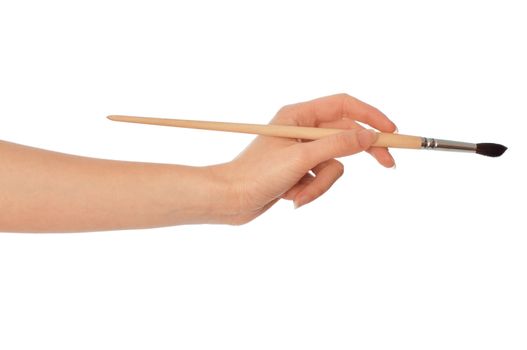 woman drawing a picture with a brush