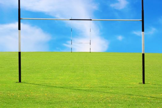 abstract view of empty rugby field and goalposts