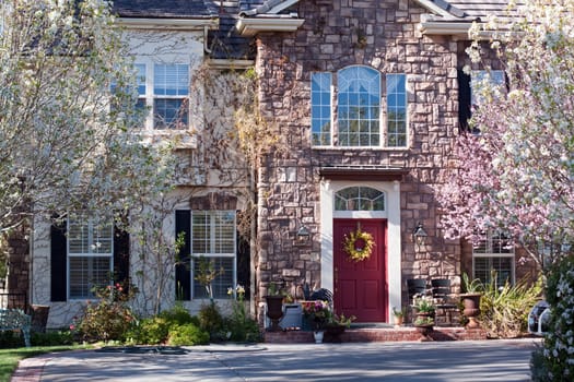 Home, luxurious mansion with blooming landscape and beautiful windows