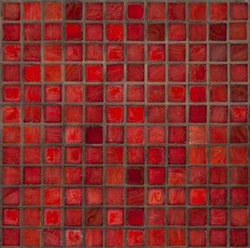 Decorative glass tiles in a bright red small squares