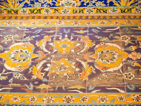 Closeup colorful floor tiles in historical building, Ali Qapu in Isfahan, Iran