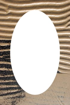 Background of the sea shore fragment. Sea sand waves form at the coast. Isolated white oval place for text photograph image in center of frame.