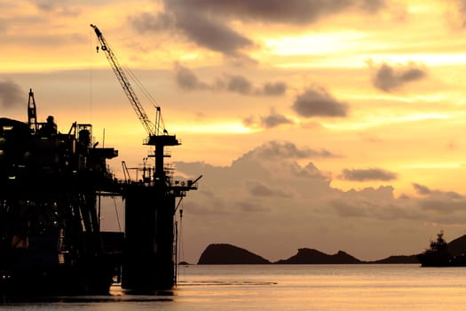 Silhouette of dock- and shipbuilding company at sunset