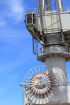 Close up shot of a crane at a harbou