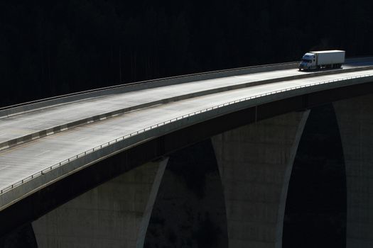 Semi trailer truck crossing a high level bridge in British Columbia, Canada