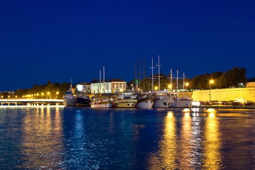 Fishing boats in safe harbor on evening in Zadar, Croatia, Dalmatia