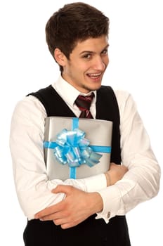 happy man holding in the hands the gray box with blue ribbon as a gift