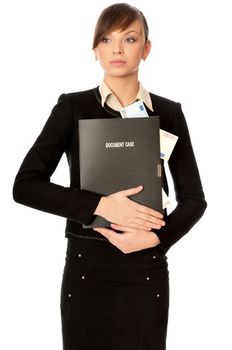 Business woman holding the document case with money in the hands as a symbol of wealth