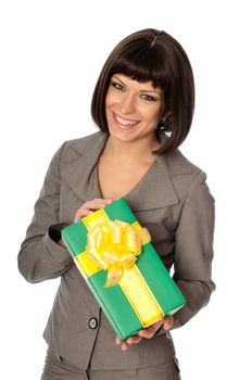 Woman holding a green box with yellow bow as a present