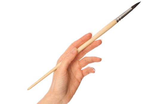 woman drawing a picture with a brush