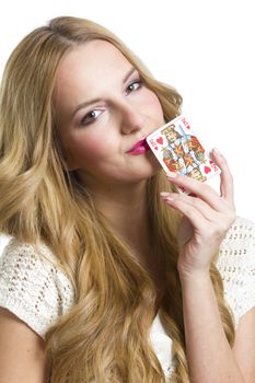 Young woman holding heart playing card in valentine's day, on white background