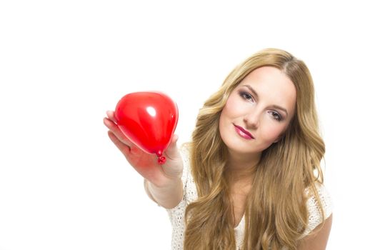 Young woman holding red heart in valentine's day, on white background