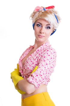 Pinup styled housewife in gloves over white